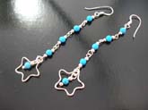 Stylish high quality 925 sterling silver  fish hook earrings with turquoise stones dangling on chain and in hollowed out star 