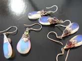 trendy rain drop shaped moon gemstone held by high quality 925 sterling silver  decor on fish hook earrings