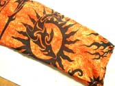 Fiery orange batik sarong with tribal sun and dolphin image