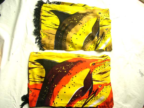 Swimming dolphin image on yellow balinese sarong, Canada clothing exchange