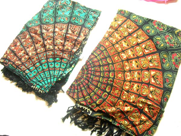 Ornate circular fan design on sarong, online fashion market
