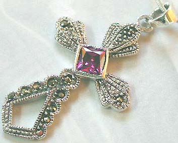 Lot costume jewelry, wholesale a sterling silver cross with an amethyst in the center