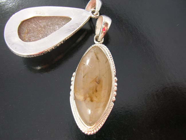 Quartz crystal fashions, gemstone jewelry, sterling silver pendant, ladies costume jewelry, high fashion apparel, unique designs