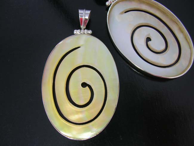 Handcrafted gemstones, sterling silver jewelry, fine fashion accessories, ladies engagement gifts, designer island apparel