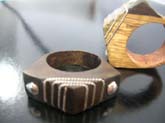 handcrafted wood ring with high quality 925 sterling silver  lined and circle design. Varity of colors and designs randomly choosed by our order pickers.